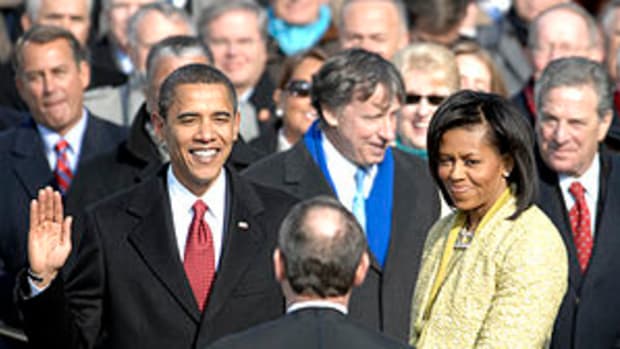 With his family by his side, Barack Obama is s...