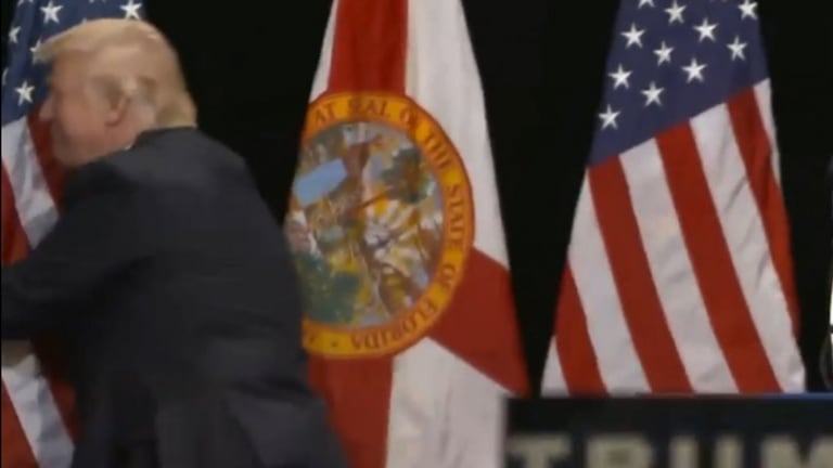 Donald Trump Sexually Assaults American Flag Onstage at Rally