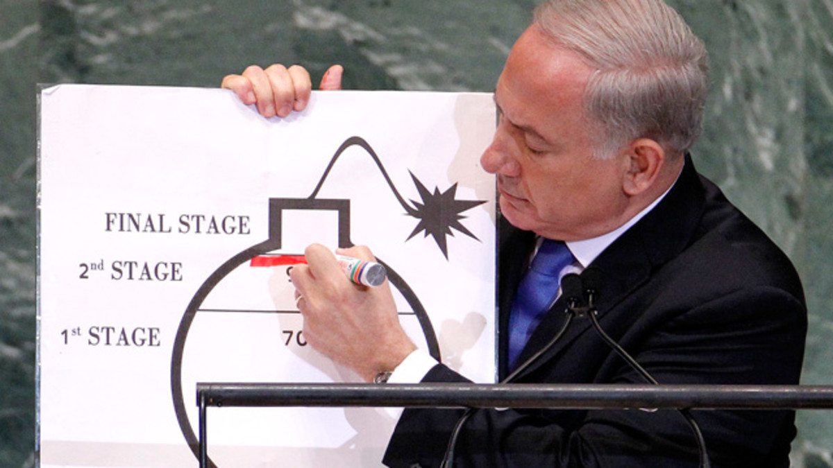 Israeli PM Binyamin Netanyahu draws a r