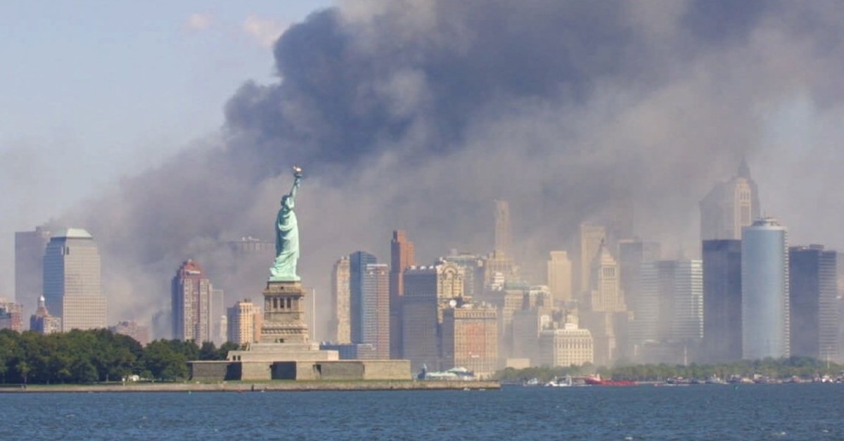 o-THE-STATUE-OF-LIBERTY-STANDS-AS-SMOKE-BILLOWS-facebook.jpg